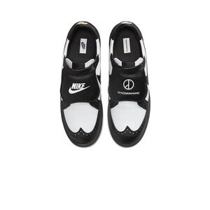 Nike Black and White Slip-On Sneakers